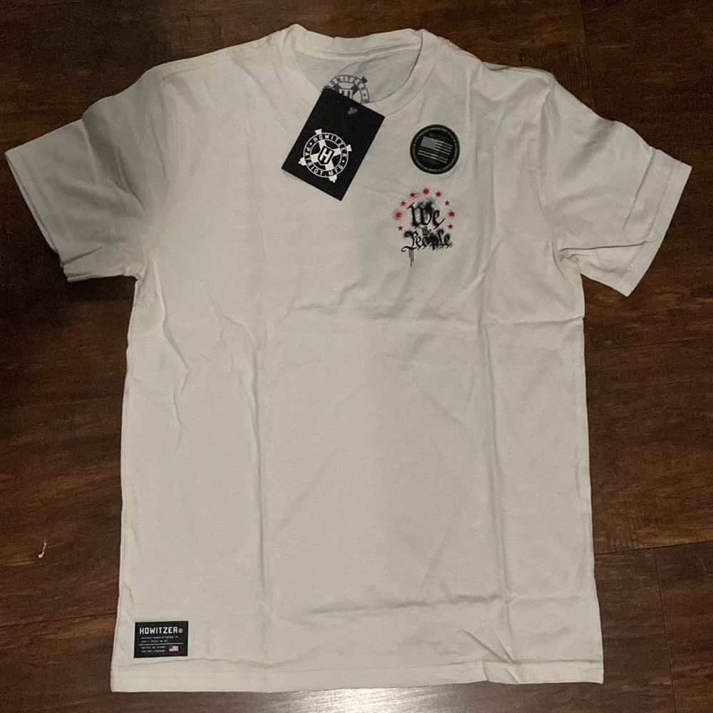 Howitzer shirt with tags . Size Xl for Girls . White color !